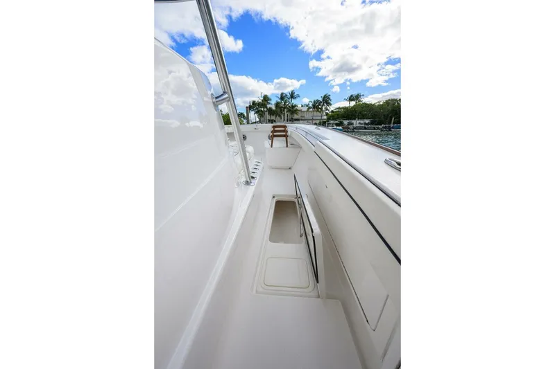 Slide: The Image of 2025 Valhalla Boatworks V-41 deck view with sleek design and clear blue sky. - 35