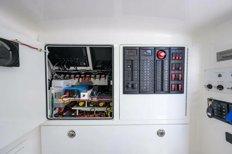 Slide: The Image of Electrical panel and wiring inside 2025 Valhalla Boatworks V-41 boat. - 51