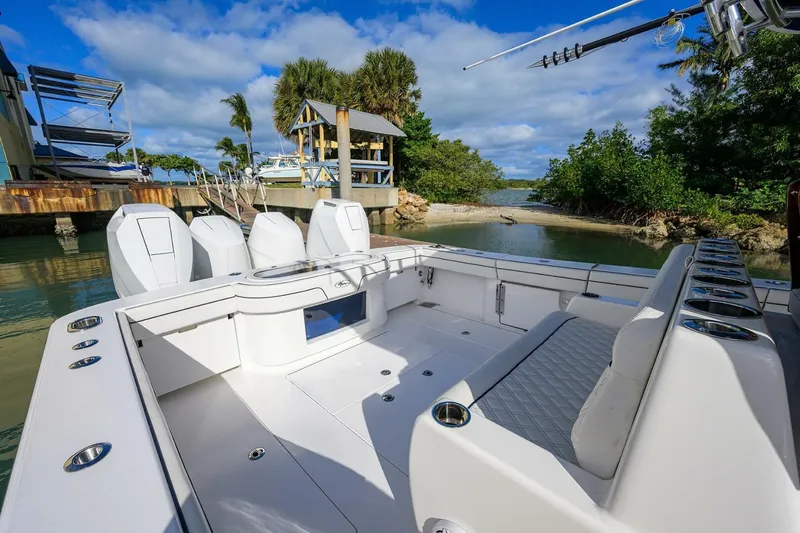 Slide: The Image of 2025 Valhalla Boatworks V-41, spacious deck, docked near tropical shoreline. - 6