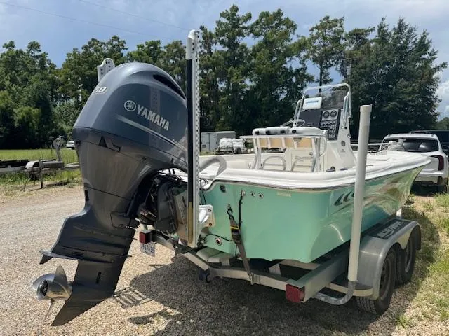 Slide: The Image of 2016 Blue Wave 2200 PureBay boat with Yamaha engine on trailer, parked outdoors. - 6