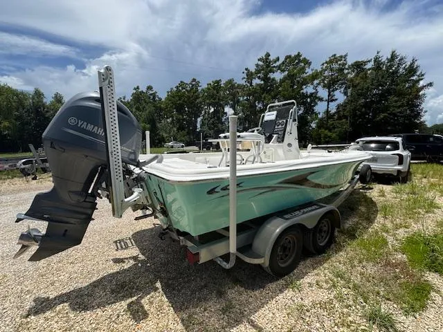 Slide: The Image of 2016 Blue Wave 2200 PureBay boat with Yamaha motor on trailer, parked outdoors. - 8