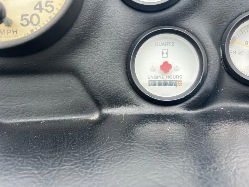 Slide: The Image of 1993 Correct Craft Ski Nautique dashboard showing 777.5 engine hours. - 6