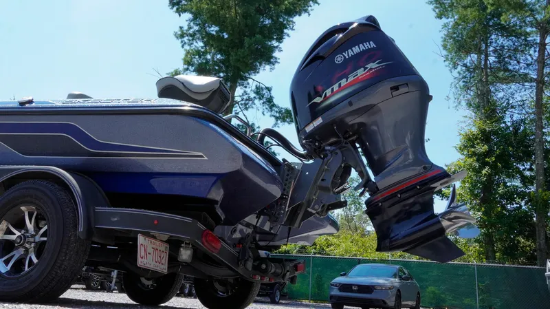 Slide: The Image of 2021 Skeeter ZX200 boat with Yamaha VMAX engine, parked outdoors. - 16