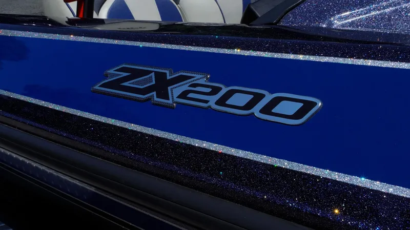 Slide: The Image of 2021 Skeeter ZX200 boat with glittery blue finish and bold logo. - 20