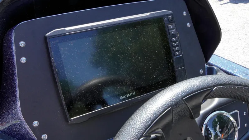 Slide: The Image of 2021 Skeeter ZX200 dashboard with Garmin display and steering wheel. - 23