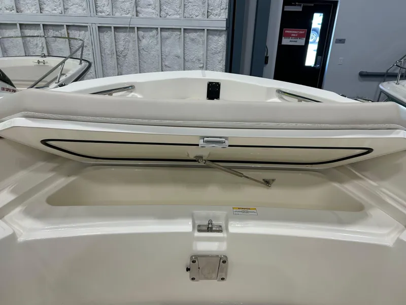 Slide: The Image of 2025 Boston Whaler 220 Dauntless boat interior storage compartment. - 14