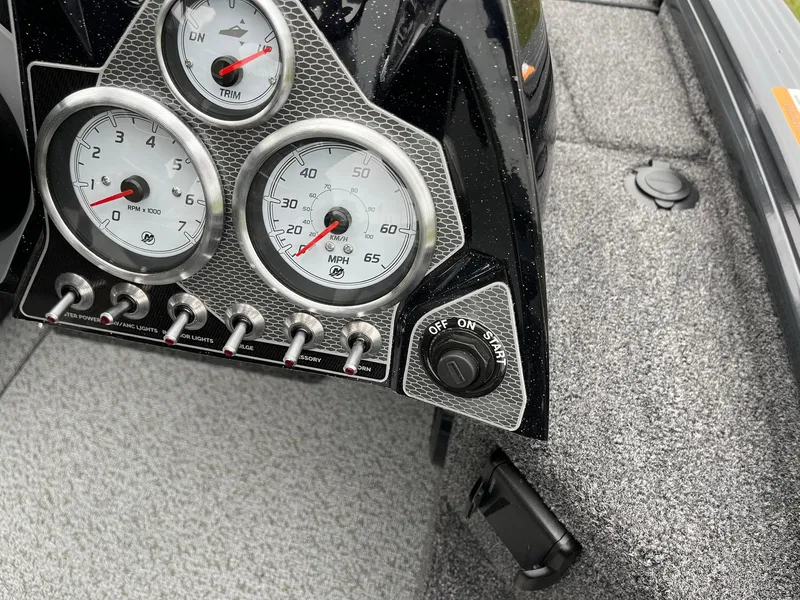 Slide: The Image of Dashboard of 2026 Lund 1875 Pro-V Bass XS with gauges and switches. - 15