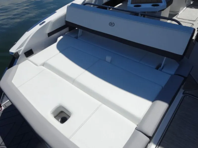 Slide: The Image of 2024 Cobalt R6 boat with sleek white seating and modern design. - 11