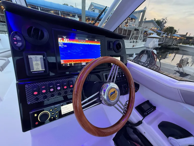 Slide: The Image of Yamaha four-stroke engine on 2020 Cutwater C-24 DC boat in storage. - 10