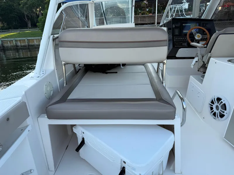 Slide: The Image of 2020 Cutwater C-24 DC boat interior with seating and storage compartments. - 12