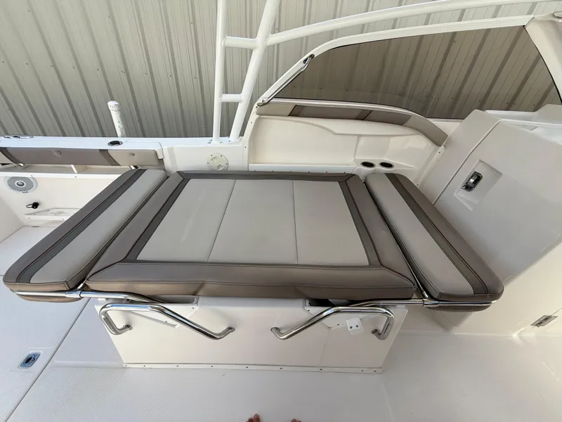 Slide: The Image of 2020 Cutwater C-24 DC boat interior with steering wheel and control panel. - 17