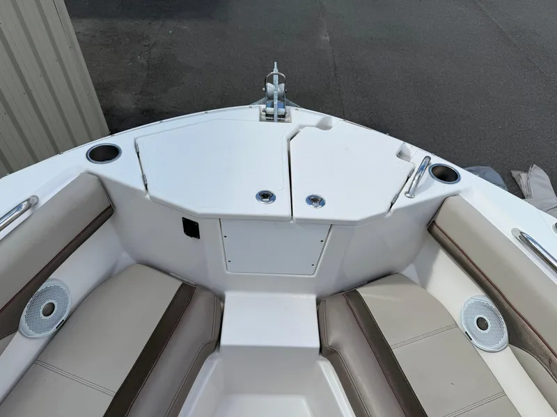 Slide: The Image of 2020 Cutwater C-24 DC boat interior with seating and engine compartment. - 28