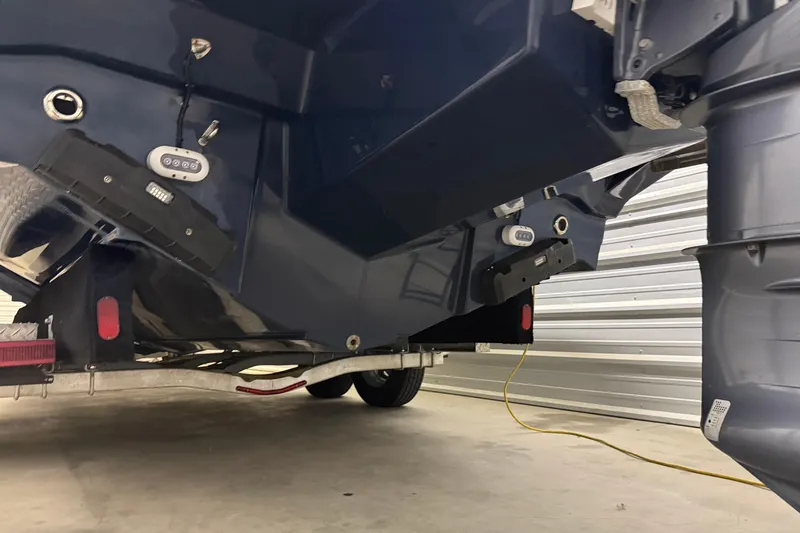 Slide: The Image of 2020 Cutwater C-24 DC boat with sleek design and metallic trim. - 4