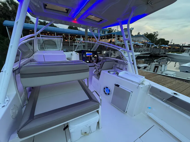 Slide: The Image of Interior view of a 2020 Cutwater C-24 DC boat, featuring a compact cabin space. - 42