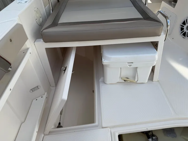 Slide: The Image of 2020 Cutwater C-24 DC boat on trailer, parked outside industrial building. - 49