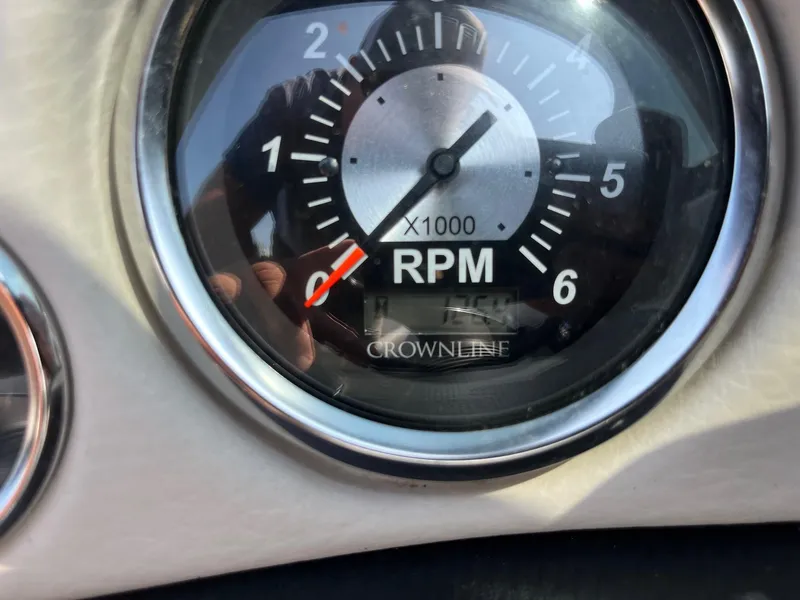Slide: The Image of Close-up of a 2014 Crownline 18 SS RPM gauge, showing 1,000 RPM. - 10