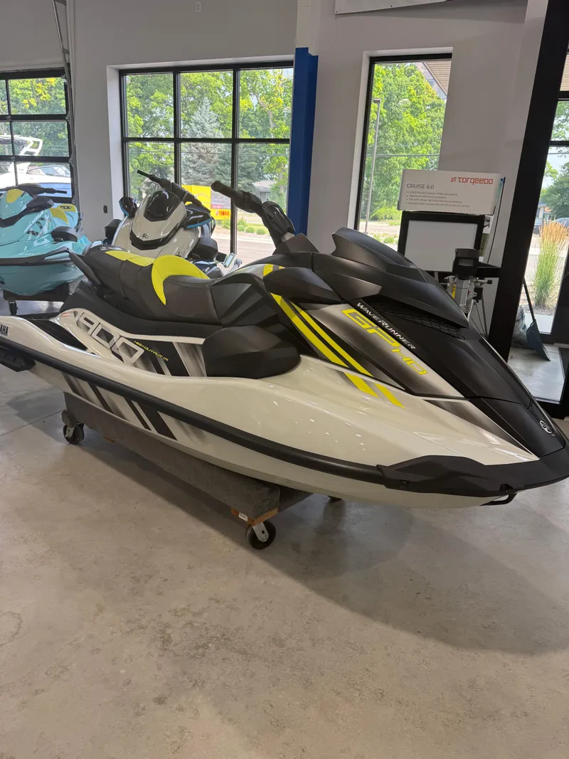 The Image of 2025 Yamaha WaveRunner GP HO with Audio, displayed indoors, featuring sleek design and vibrant accents. - 1