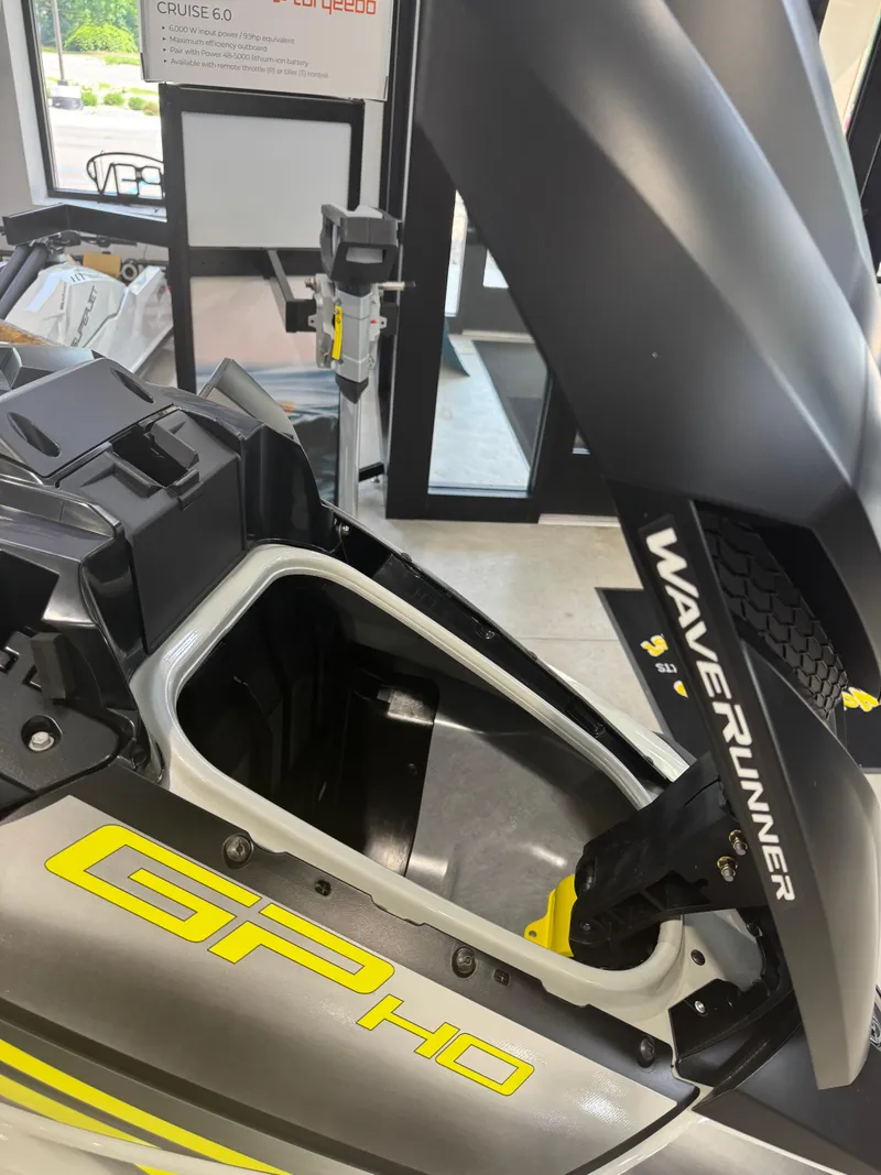 Slide: The Image of 2025 Yamaha WaveRunner GP HO with Audio, open storage compartment, indoor display. - 10