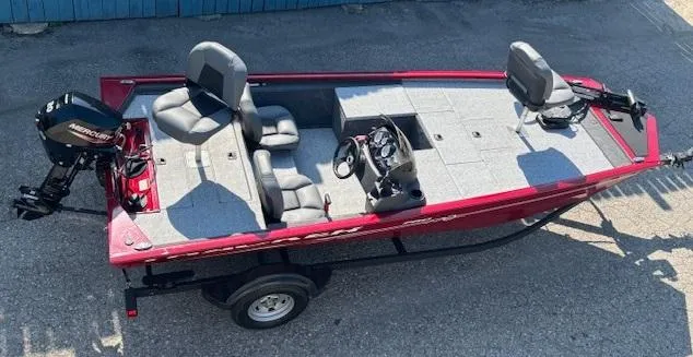 Slide: The Image of 2024 Tracker Pro 170 fishing boat with Mercury outboard motor, red exterior, and dual seating. - 4