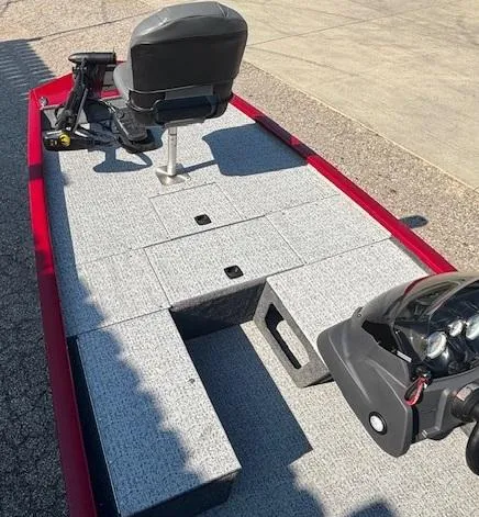 Slide: The Image of 2024 Tracker Pro 170 boat interior with seating and control panel, featuring a sleek design. - 6