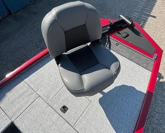 Slide: The Image of 2024 Tracker Pro 170 boat with gray seat and red trim on deck. - 8