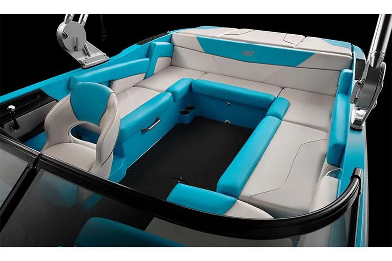 Slide: The Image of Manufacturer Provided Image: 2019 MasterCraft NXT22 boat interior with blue and white seating. - 18