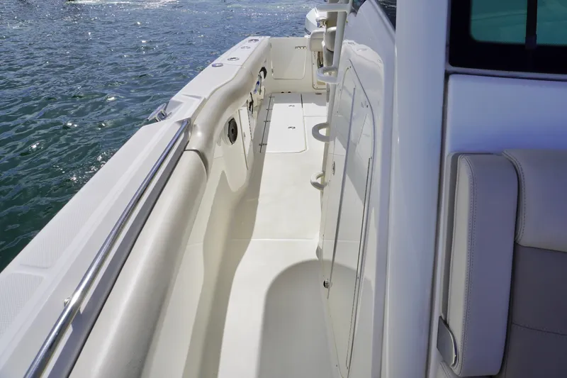Slide: The Image of 2021 Boston Whaler 330 Outrage boat deck with ocean view. - 13