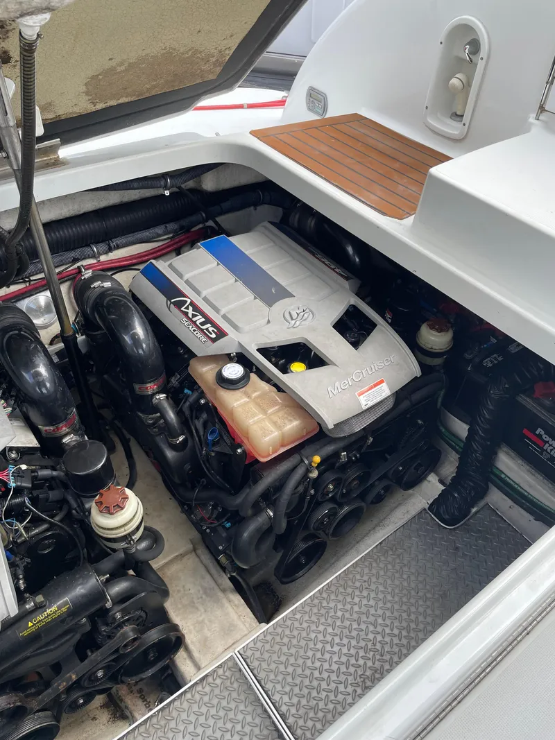 Slide: The Image of Engine compartment of a 2010 Formula 350ss boat with MerCruiser engine. - 25