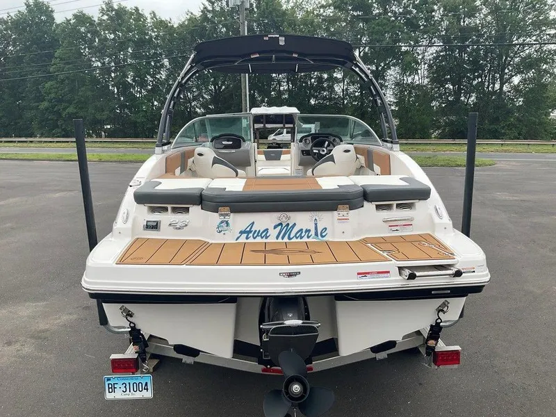 Slide: The Image of 2023 Chaparral 23 SSi boat with custom name "Ava Marie" on the deck. - 13