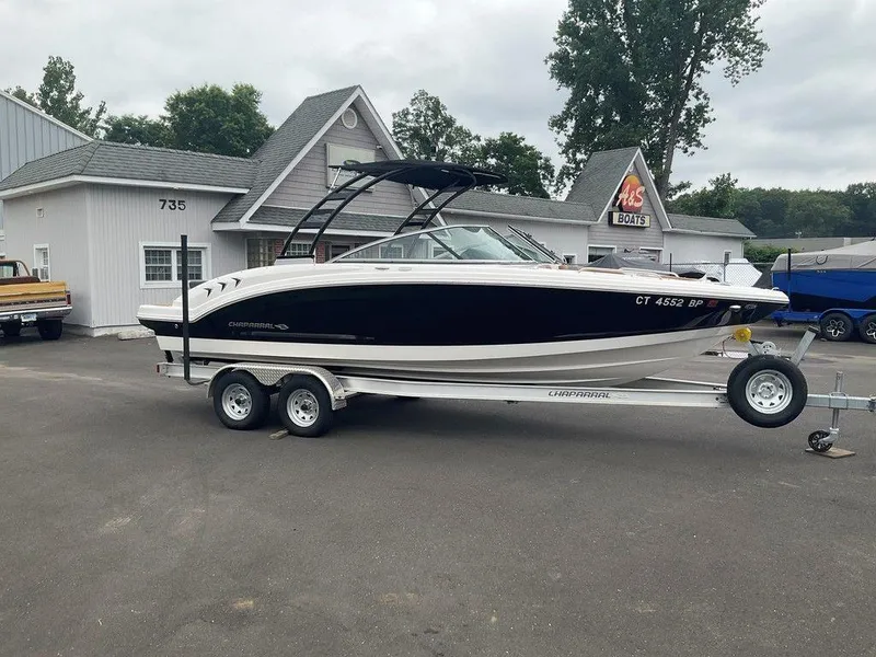 Slide: The Image of 2023 Chaparral 23 SSi boat on trailer outside dealership. - 4