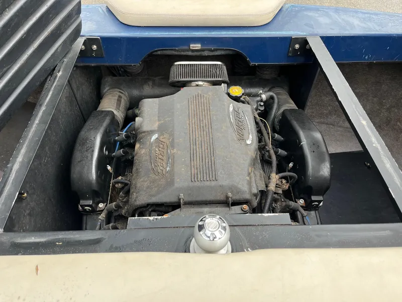 Slide: The Image of 2007 Malibu Wakesetter 247 LSV engine compartment, showcasing the inboard motor. - 12