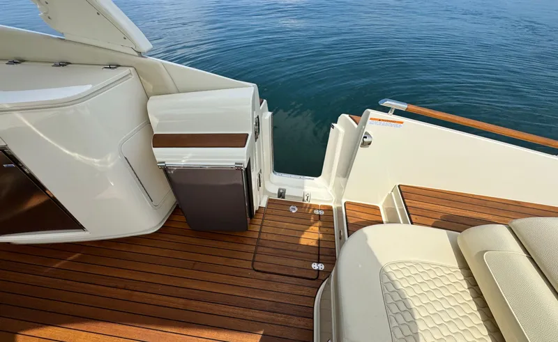 Slide: The Image of 2022 Chris-Craft Launch 35 GT I/O Heritage Edition boat deck with elegant wood finish. - 16