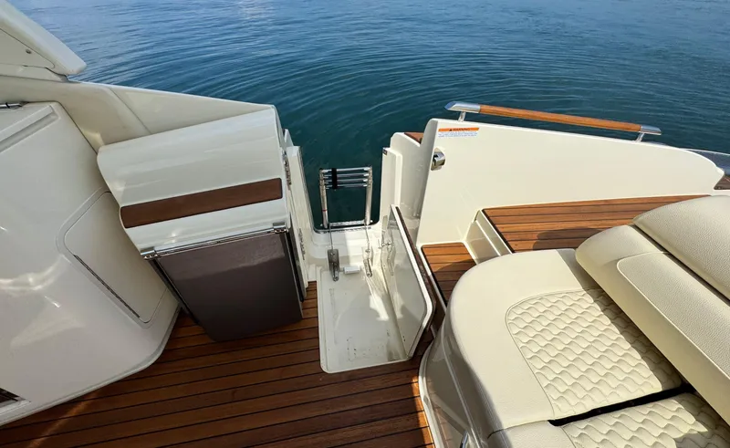 Slide: The Image of 2022 Chris-Craft Launch 35 GT I/O Heritage Edition boat with elegant deck and seating. - 17
