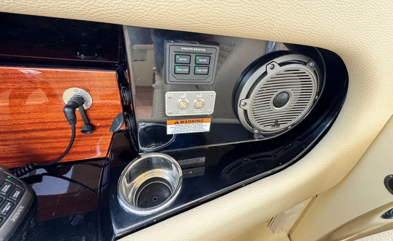 Slide: The Image of Dashboard of 2022 Chris-Craft Launch 35 GT I/O Heritage Edition with speaker and controls. - 23