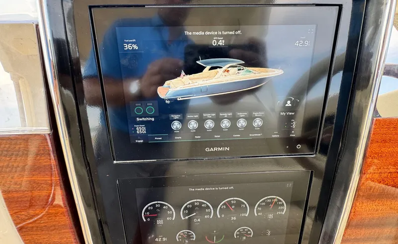 Slide: The Image of Dashboard display of 2022 Chris-Craft Launch 35 GT I/O Heritage Edition boat. - 24