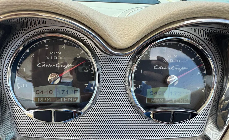Slide: The Image of Dashboard of 2022 Chris-Craft Launch 35 GT I/O Heritage Edition showing RPM and temperature gauges. - 27