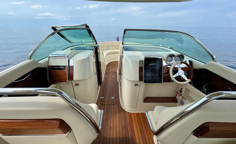 Slide: The Image of 2022 Chris-Craft Launch 35 GT I/O Heritage Edition interior with elegant wood and leather finishes. - 34