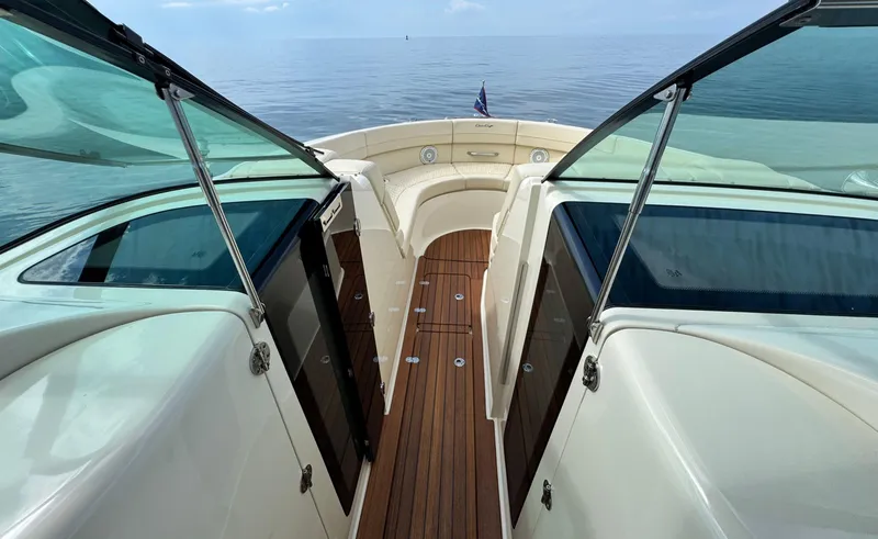 Slide: The Image of 2022 Chris-Craft Launch 35 GT I/O Heritage Edition boat interior with teak flooring. - 35