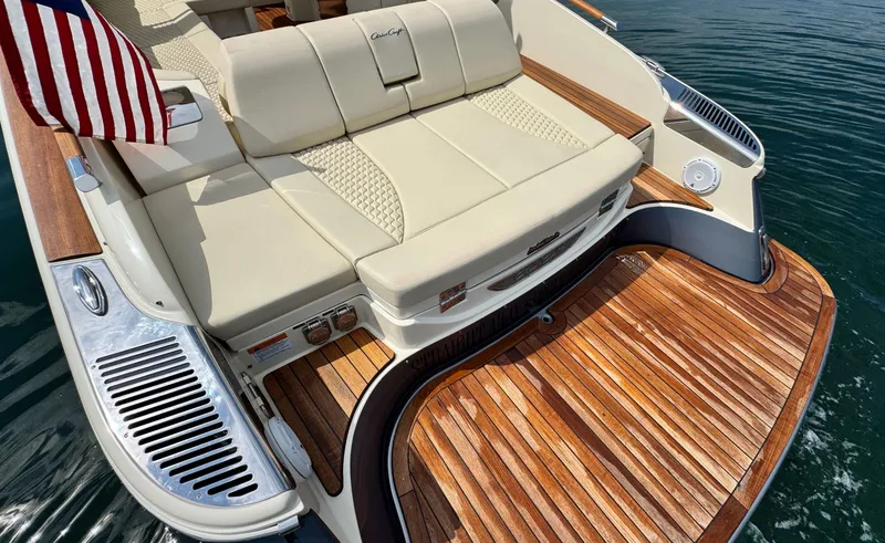 Slide: The Image of 2022 Chris-Craft Launch 35 GT I/O Heritage Edition with elegant teak deck and plush seating. - 8