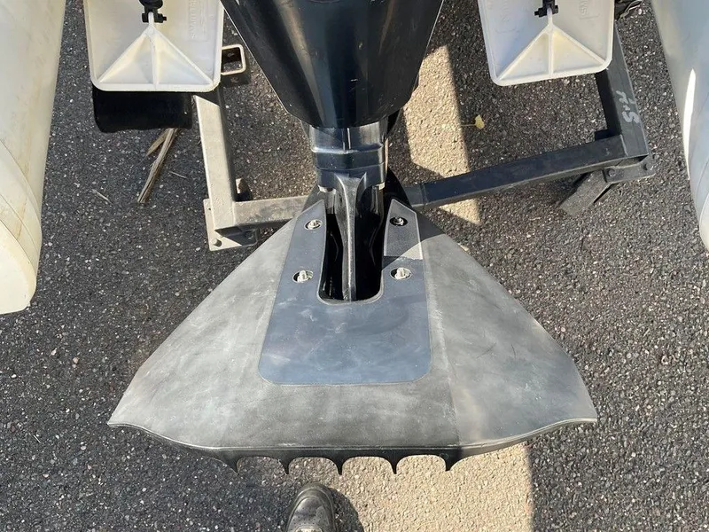 Slide: The Image of 2016 Brig F330HT boat motor and propeller on asphalt surface. - 16