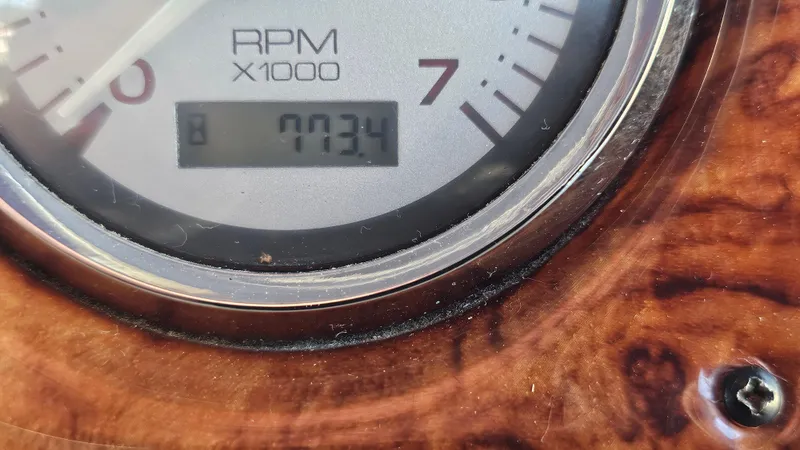 Slide: The Image of Close-up of 2003 Rinker Fiesta Vee 270 RPM gauge reading 773.4 hours. - 22