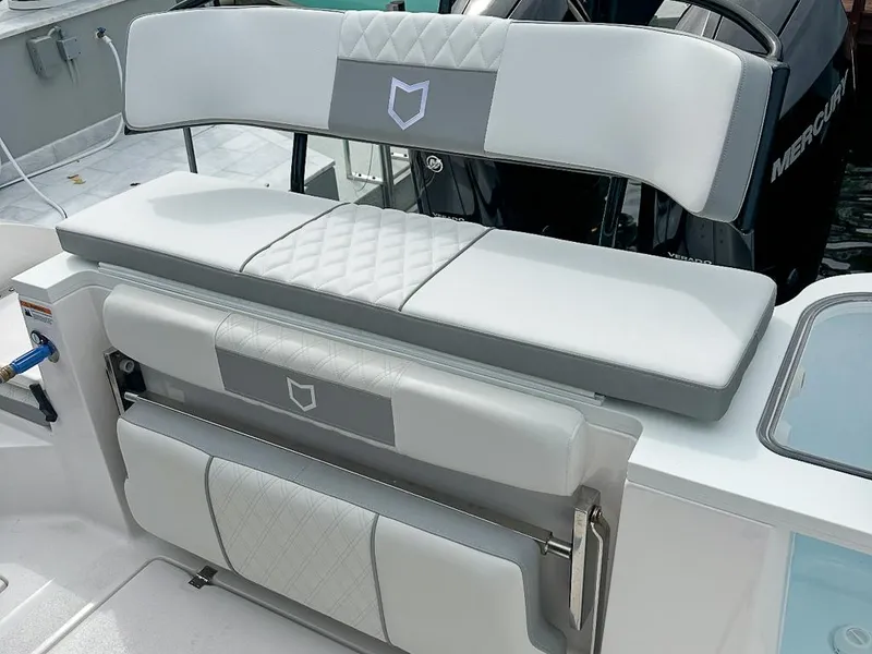 Slide: The Image of 2024 Sea Fox 328 Commander boat seating with quilted upholstery and sleek design. - 14