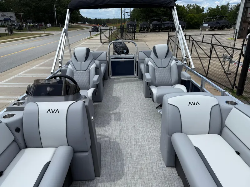 Slide: The Image of 2025 Avalon VENTURE QUAD LOUNGER pontoon boat with luxurious seating and modern design. - 14