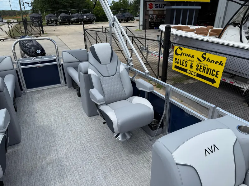 Slide: The Image of 2025 Avalon VENTURE QUAD LOUNGER interior with luxurious seating at Grass Shack sales location. - 16