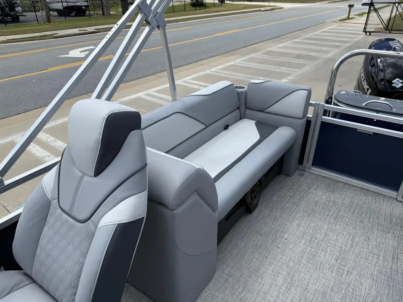 Slide: The Image of 2025 Avalon VENTURE QUAD LOUNGER interior with sleek gray seating and modern design. - 18