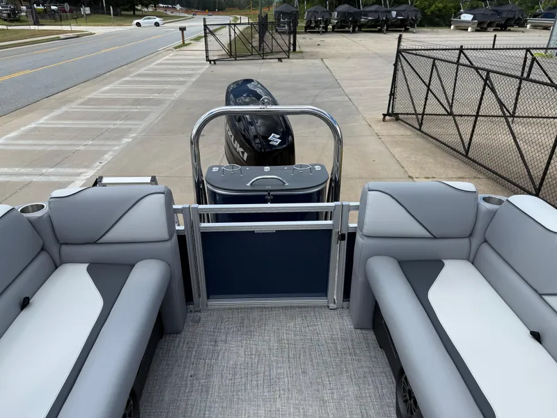 Slide: The Image of 2025 Avalon VENTURE QUAD LOUNGER pontoon boat with spacious seating and modern design. - 20