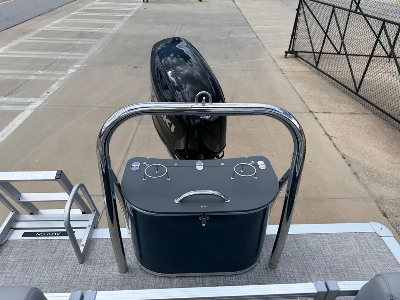 Slide: The Image of 2025 Avalon VENTURE QUAD LOUNGER boat with sleek design and powerful engine. - 21