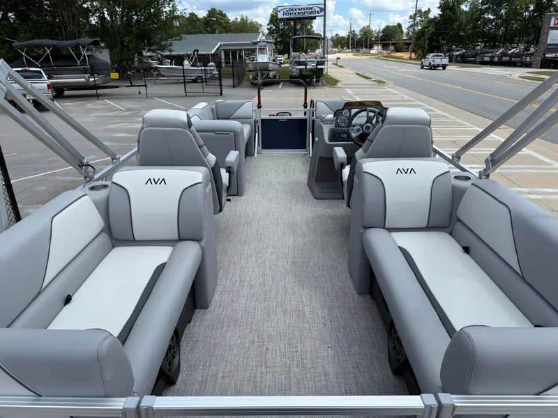 Slide: The Image of 2025 Avalon VENTURE QUAD LOUNGER pontoon boat with spacious seating and modern design. - 26