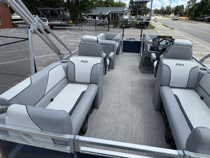 Slide: The Image of 2025 Avalon VENTURE QUAD LOUNGER pontoon boat with spacious seating and modern design. - 28