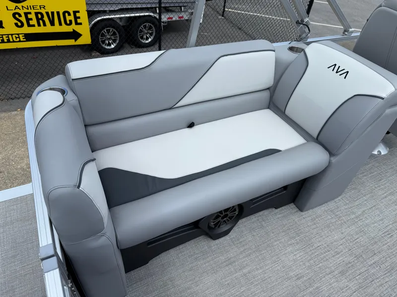 Slide: The Image of 2025 Avalon VENTURE QUAD LOUNGER boat seat, gray and white upholstery, outdoor setting. - 29
